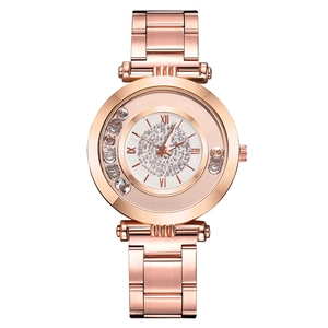 Montre élégante en or rose pour femme avec cadran à paillettes et bracelet en métal