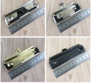 Detail view of metal clipboard clips in silver gold and black with size reference