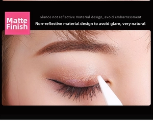 Detailed view of matte invisible eyelid tape applied with a white applicator tool