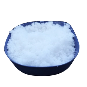 Artificial instant snow powder in a blue bowl for Christmas decoration and landscaping