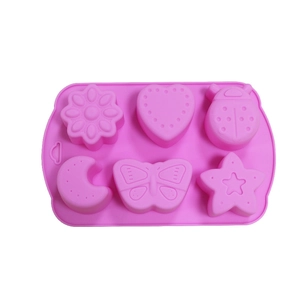 Pink silicone mold with 6 cavities featuring hearts, ladybugs, butterflies, and flowers