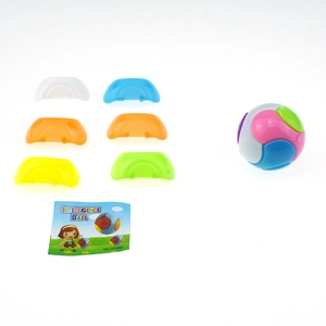 Macro detail of multicolored DIY assembly ball pieces with instruction card and components