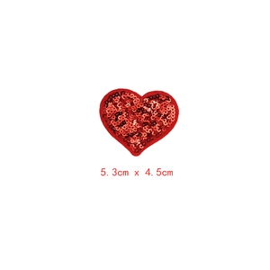 Detailed close-up of a red sequin heart patch showing 5.3cm x 4.5cm dimensions