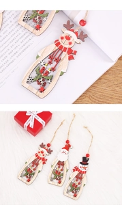 Detail of laser-cut wooden Christmas ornaments with Santa, reindeer and snowman designs