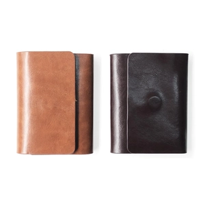 Classic men's PU leather bi-fold wallet in brown and dark brown colors shown in a flat lay