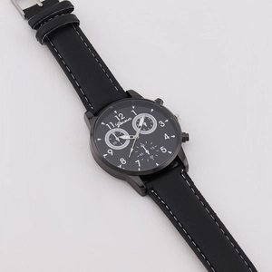 Geneva men's fashion watch with black leather strap and black dial on light background