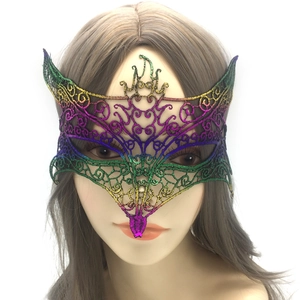 Detail of colorful gradient lace masquerade mask with embroidery and sequins on model