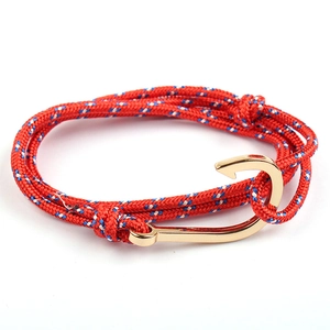 Nautical anchor bracelet with red white blue woven rope and golden metal hook clasp