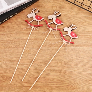 Set of 3 wooden reindeer Christmas stakes with jute bows for festive table decoration