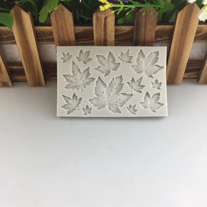 Grey silicone mold with various maple leaf patterns for DIY fondant cake decoration