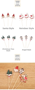 Detail of wooden Christmas picks with Santa, reindeer, tree and angel on table