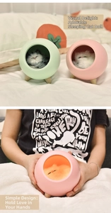 Detail of cute cat night light showing its compact size and soft macaron colors