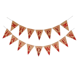 Detail of Happy Halloween kraft paper banners with red letters and skull patterns