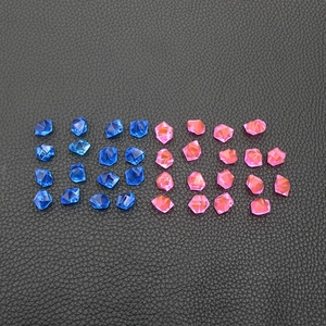 Close-up of irregular blue and pink crystal acrylic stones for vase and aquarium decoration