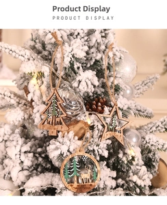 Close-up of laser-cut wooden Christmas ornaments with reindeer and forest patterns