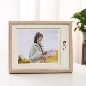 Nordic natural wood photo frame with cream mat board and minimalist aesthetic design
