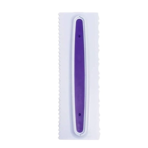 Close-up of white plastic cake scraper tool with jagged edge and purple handle