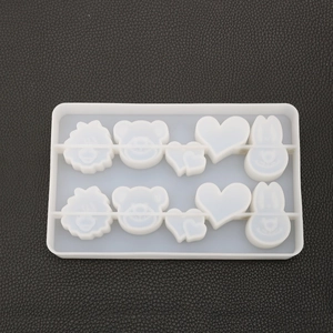 Macro view of transparent silicone mold with bear and rabbit shapes for DIY resin crafts