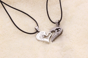 Couples heart-shaped pendant necklaces in silver and black with I Love You engraving