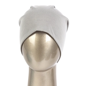 Light gray thin knit beanie cap for men and women shown on a gold head mannequin