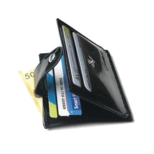 Detail view of black PU leather wallet with multi-card slots and secure metal snap closure