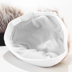 Detail shot of 100% cotton inner lining and material label on the retro docker hat