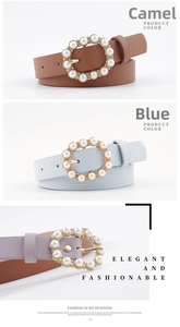 Detailed view of fashionable faux leather belts with elegant pearl-encrusted gold buckles