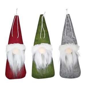 Three Christmas gnome hanging ornaments with red, green, and gray felt hats for tree decor