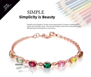 Dettaglio del bracciale in oro rosa con gemme ovali colorate e ciondolo cuore S925