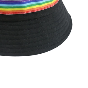 Black cotton bucket hat with rainbow stripe ribbon and detailed stitching for sun protection