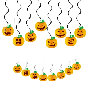 Detailed set of orange Halloween pumpkin cutouts with black spiral hanging ribbons