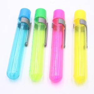 Close-up of four colorful heart-top bubble wand tubes in blue green pink and yellow