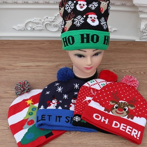 Knitted Christmas beanie hats with LED lights featuring festive reindeer and snowman patterns