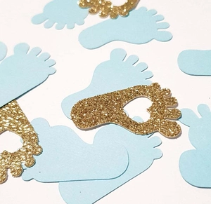 Blue and gold glitter baby feet confetti table decorations for gender reveal party