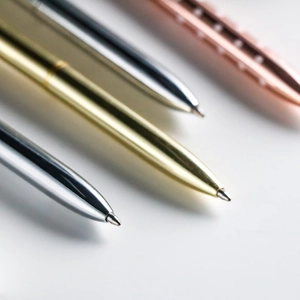 Elegant crown metal ballpoint pens in silver, gold and rose gold with a fine tip