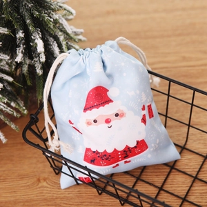 Christmas Santa Claus drawstring gift bag in light blue with snowflakes and rustic decor