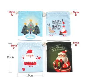 Detail showing four Christmas drawstring gift bags with Santa and reindeer patterns 20x16cm