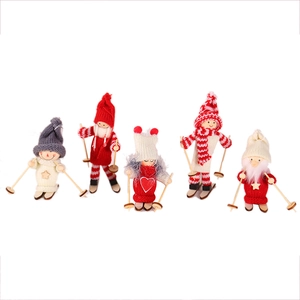 Set of five wooden Christmas ski dolls with knitted outfits for festive decorations