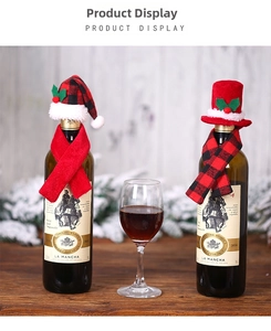 Detailed view of Christmas wine bottle decoration set with plaid hats and scarves