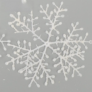 Detail of white glittered snowflake ornament with frosted texture for Christmas decor