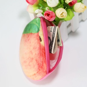 Cute peach plush coin purse with pink zipper and soft texture for girls