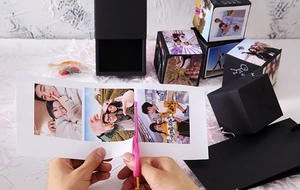 DIY creative explosion photo gift box with black folding cubes and pink craft scissors