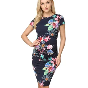 Slim fit navy maternity dress with short sleeves and vibrant tropical floral print