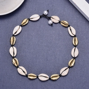Handmade gold shell and white seashell choker necklace with pearl beads on black cord
