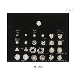 12 pairs of silver geometric stud earrings set with rhinestones and faux pearls on card
