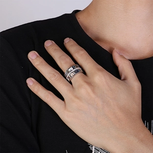 Punk style titanium steel ring featuring wave texture and single row of inlaid rhinestones