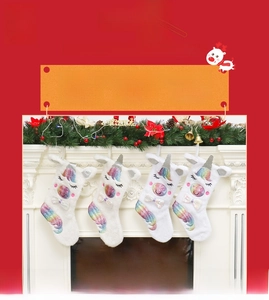 Macro detail of plush unicorn Christmas stockings with iridescent sequins and bows