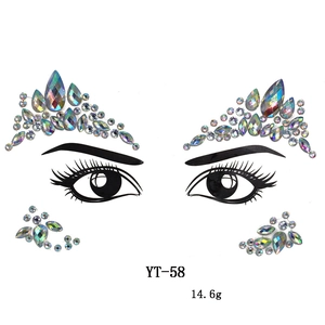 Detail of AB colored face gems and teardrop rhinestones for eye makeup decoration