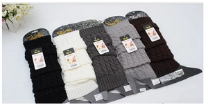 Detailed cable knit leg warmers in five colors including black grey and beige tones