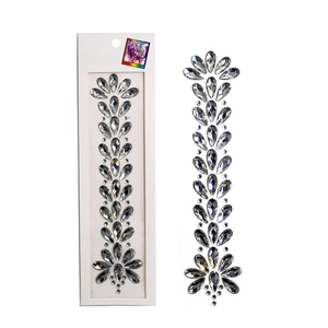 Detailed view of silver face crystal stickers with teardrop rhinestones on white packaging